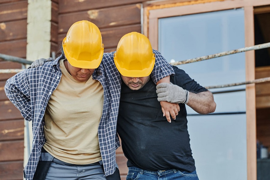 a worker supportig an injured co worker